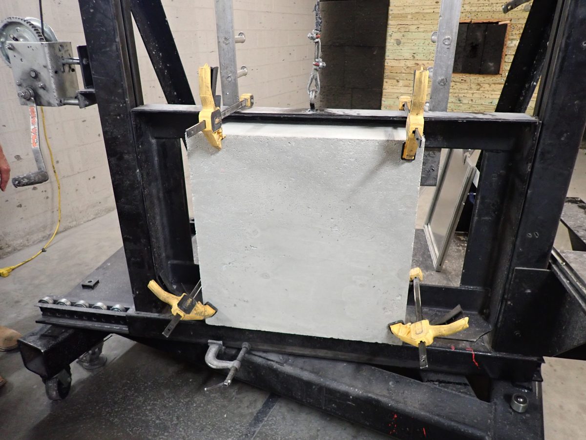 Hardened concrete protective wall construction